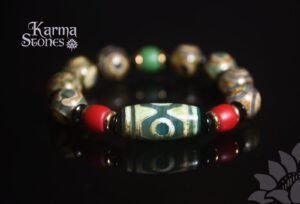 Green Dzi Bead with Red Bead Ornaments