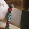 DB-25-001-03-scaled-1.jpg Green Dzi Bead with Red Bead Ornaments