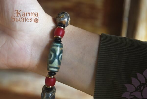 DB-25-001-03-scaled-1.jpg Green Dzi Bead with Red Bead Ornaments