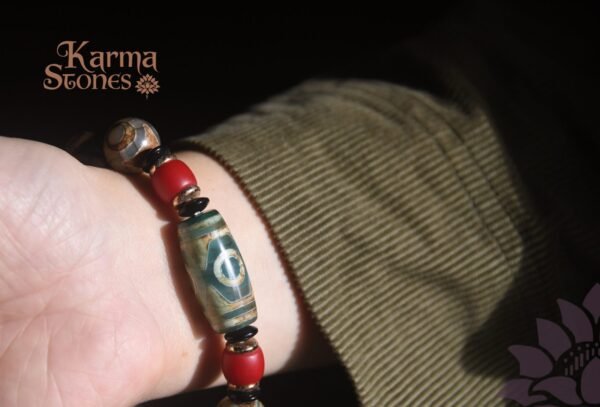 DB-25-001-05-scaled-1.jpg Green Dzi Bead with Red Bead Ornaments