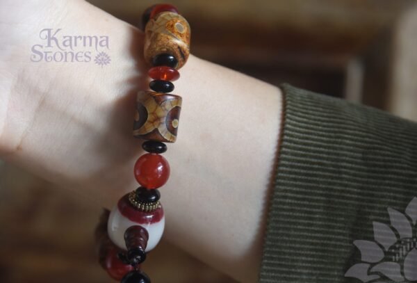 DB-25-002-03-scaled-1.jpg Brown Dzi Bead with Red Bead Ornaments